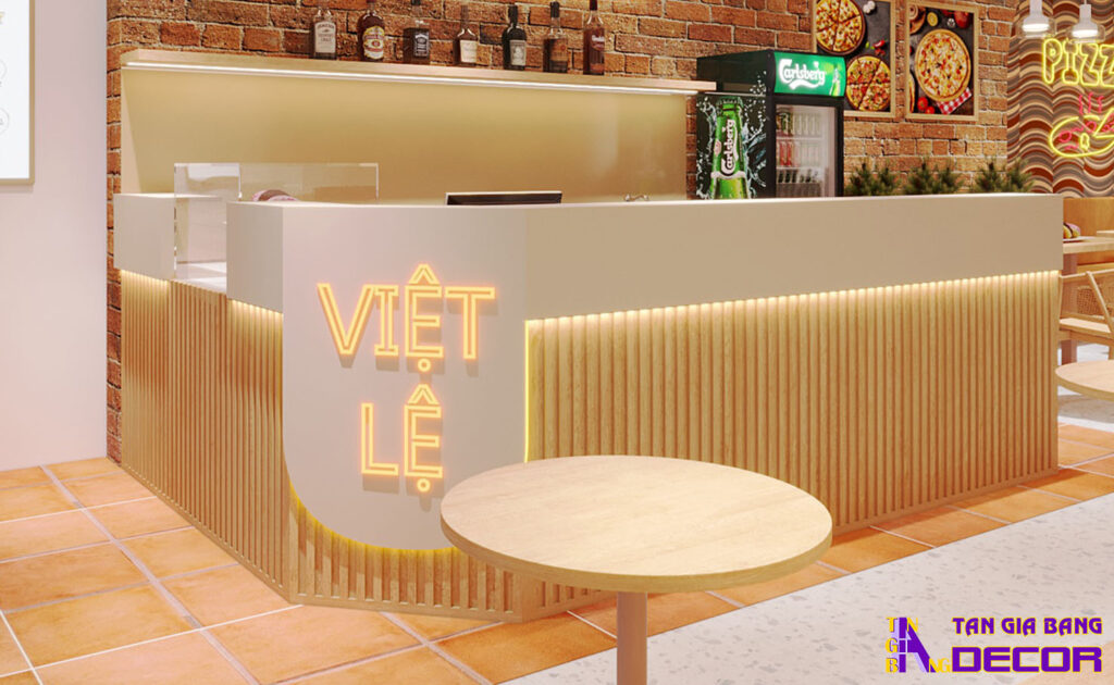 Tổng hợp 50 mẫu thiết kế quầy trà sữa đẹp! 34 Mẫu quầy chữ L vát góc với mặt trước ốp lam nhựa màu gỗ.