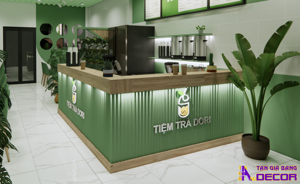 Tổng hợp 50 mẫu thiết kế quầy trà sữa đẹp! 13 Quầy bán trà sữa đẹp theo kiểu chữ L màu xanh bơ với mặt trước ốp lam nhựa.