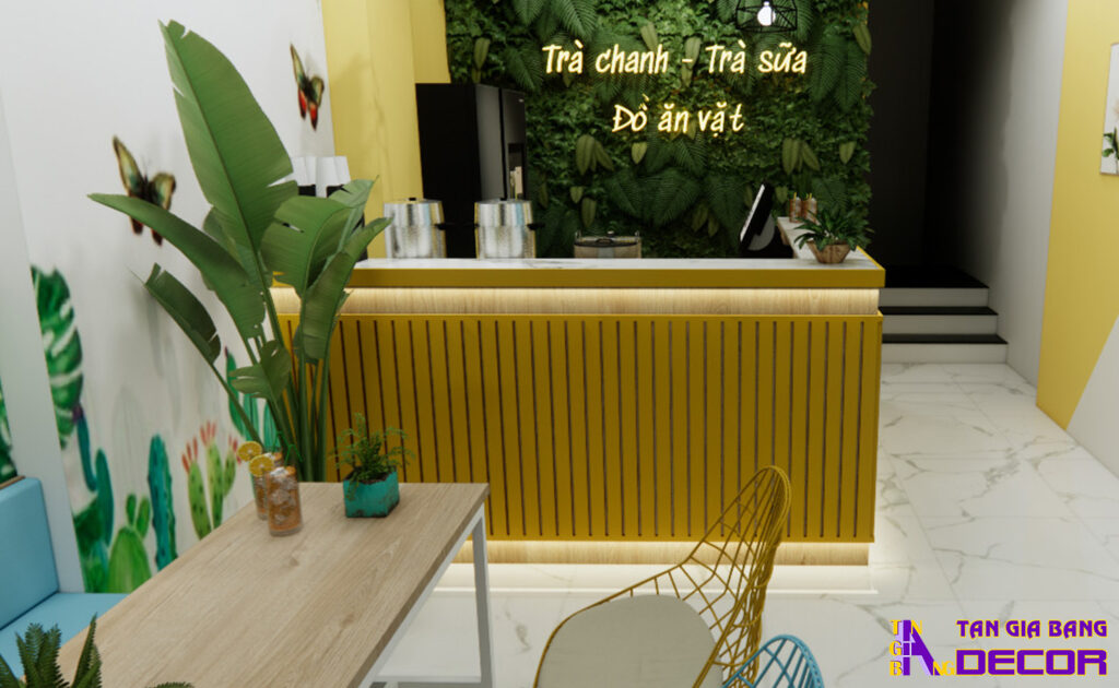 Tổng hợp 50 mẫu thiết kế quầy trà sữa đẹp! 16 Quầy trà sữa giá rẻ chữ L với mặt trước ốp lam nhựa màu vàng.